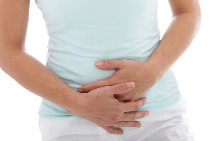 One of the symptoms of cystitis in women is persistent pain in the lower abdomen